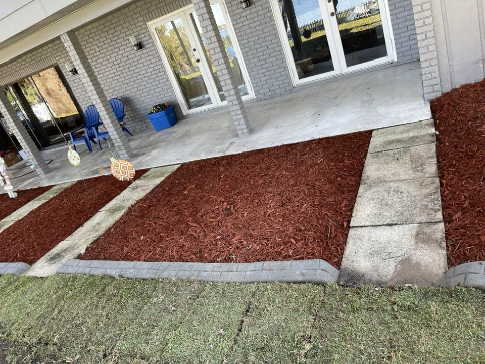 Brick edging and mulch bed